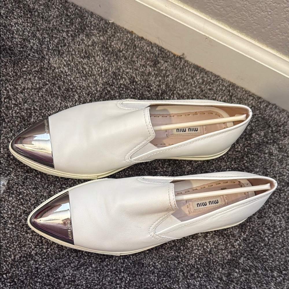 Miu Miu White and Silver Flats Sleek Slip-On Design